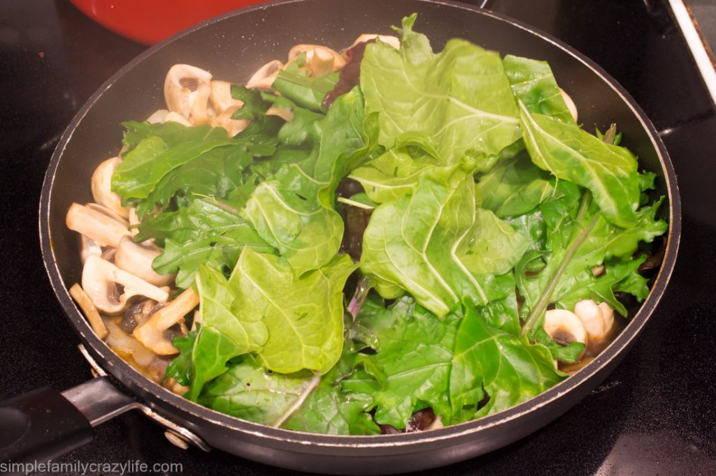 Warm mushroom salad with pine nuts and greens - vegan