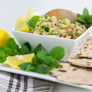 Tabbouleh Salad - a Mediterranean refreshing meal with bulgur, cucumbers, tomatoes, and herbs.